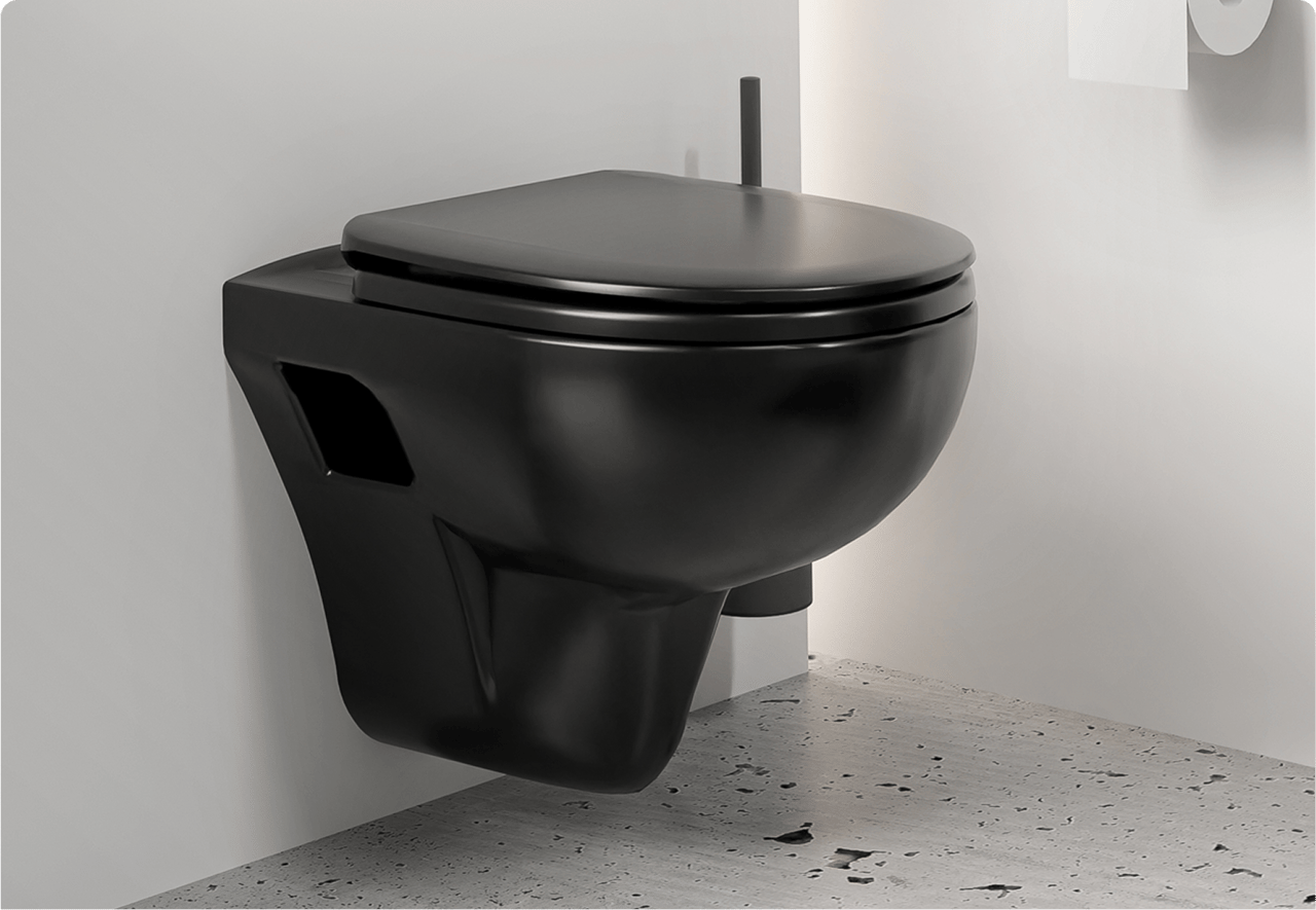 Een mat zwart toilet aan de muur gemonteerd met een zichtbare afvoerstructuur onderaan. Robuuste look van x²o badkamers.